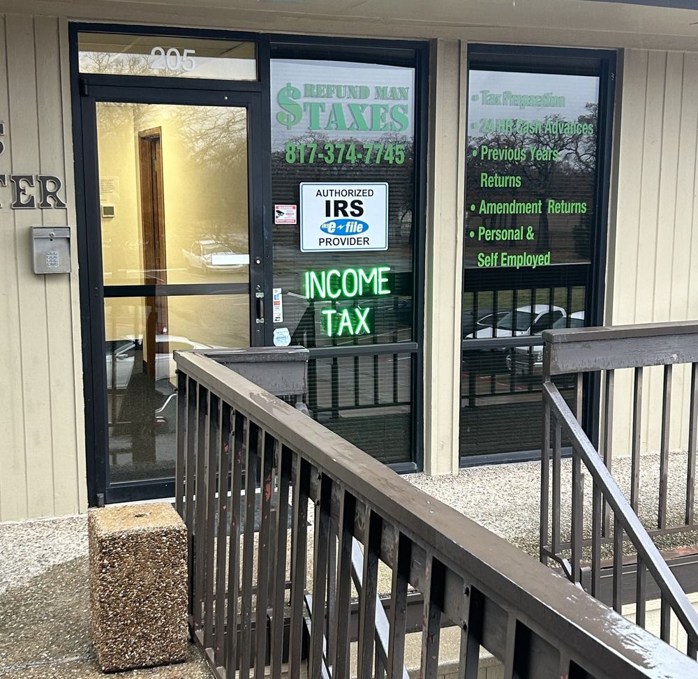 Refund Man Taxes office entrance with IRS e-file Provider sign on Little Road in Arlington, TX